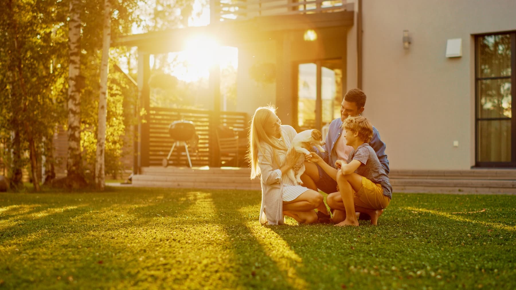 Family in front of home